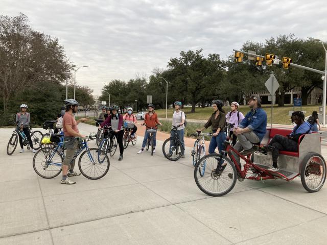 Students gathered together on bikes