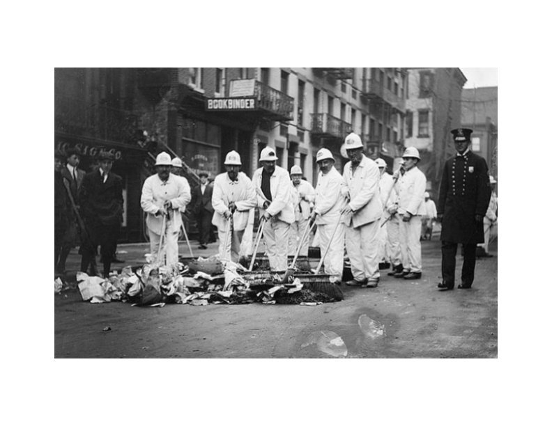 Black and white photo of sanitation workers in New York City