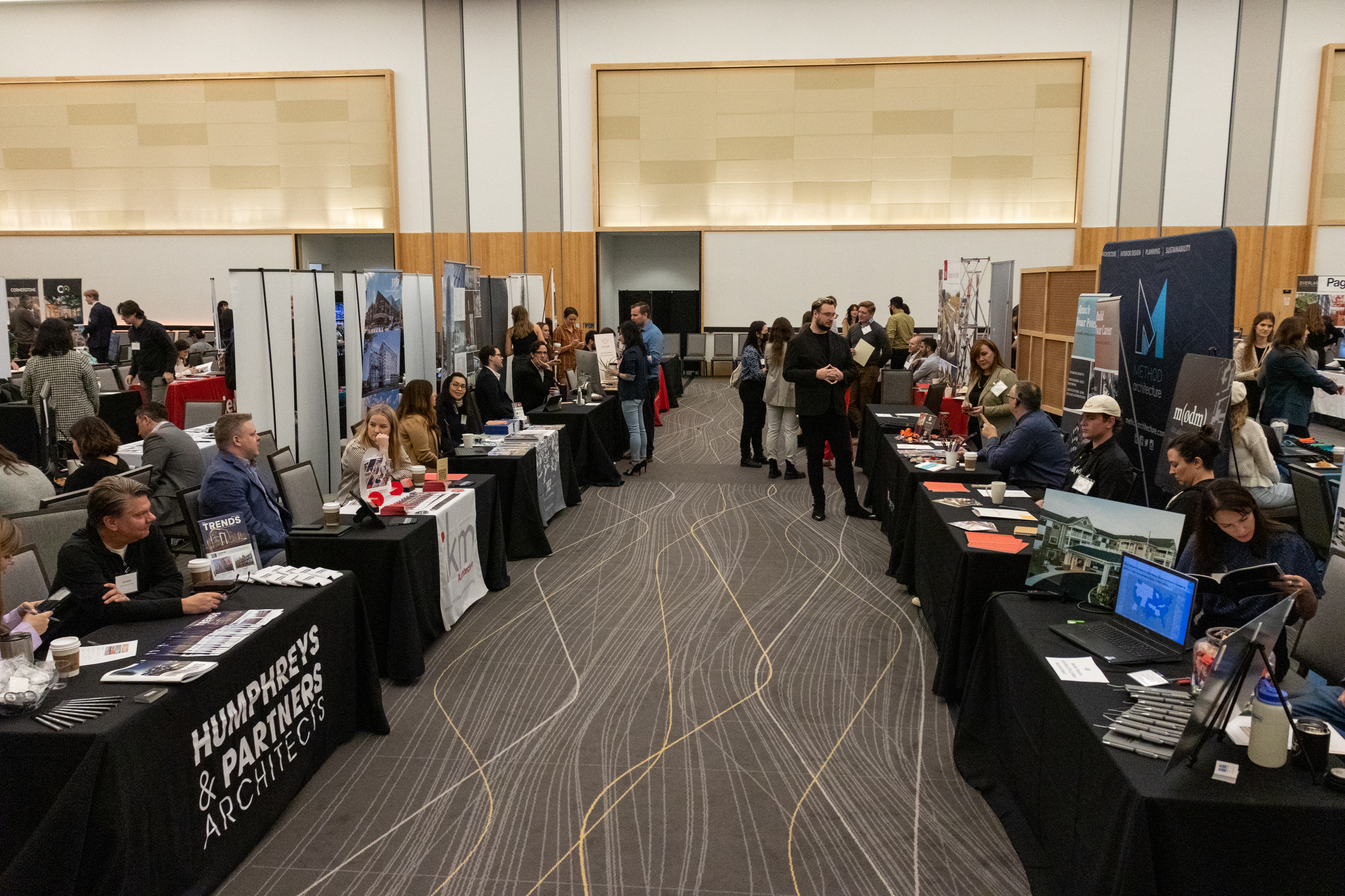 Row of employer booths set up at Career Fair