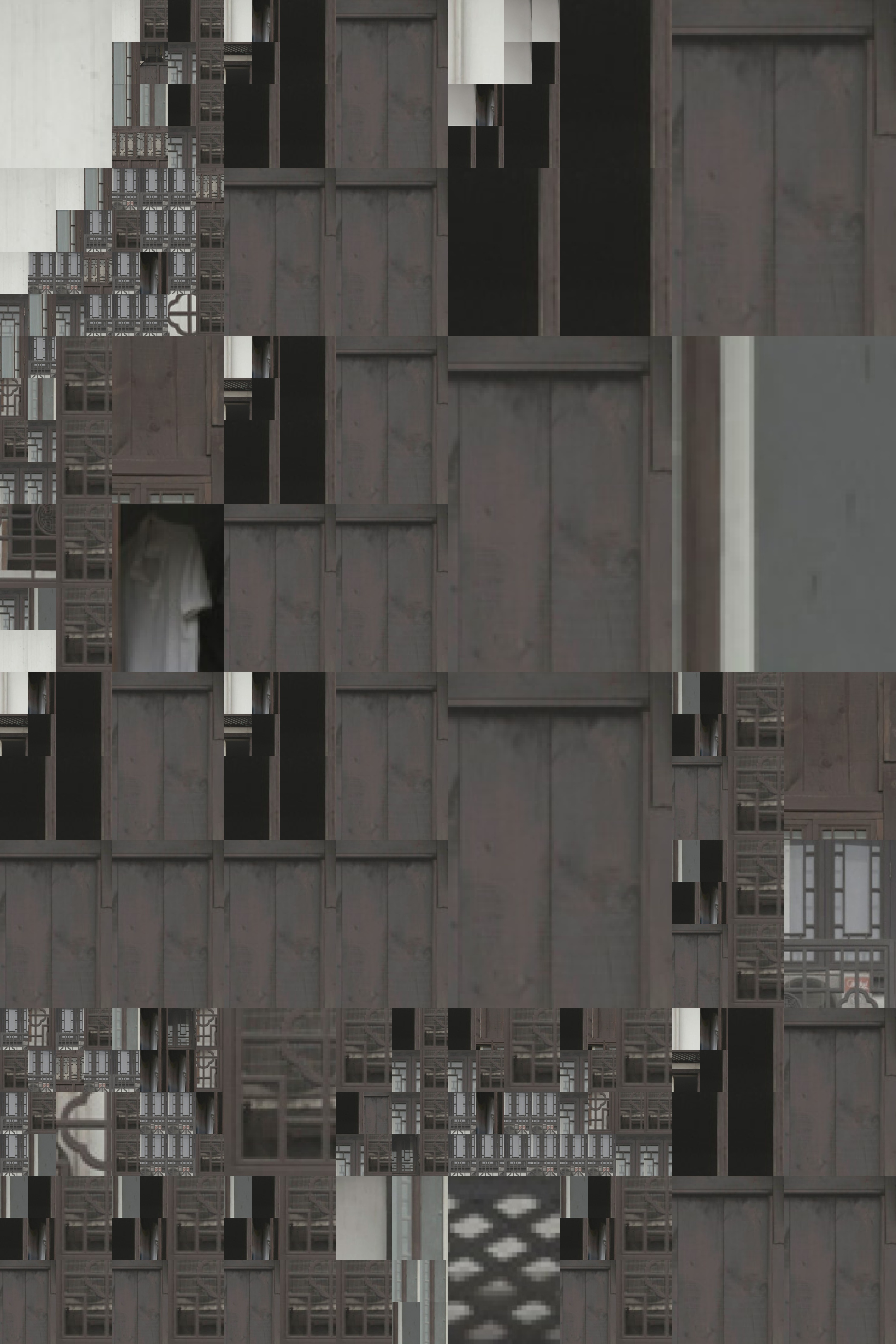A computer-generated image comprised of gray boxes of various shades and sizes.