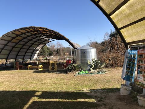 View of a covered awning from another covered awning.