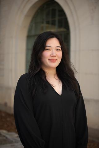 Ahyoung smiles at the camera for a headshot photo