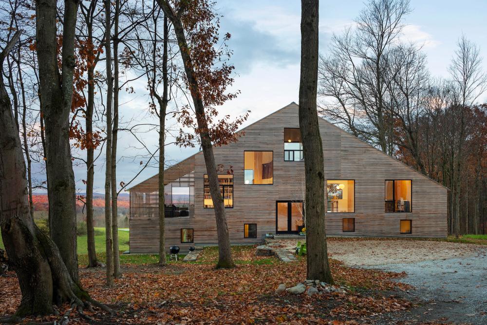 House between a forecst and a field