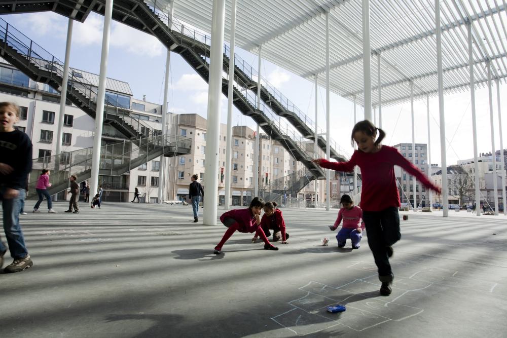 students playing in an urban environment