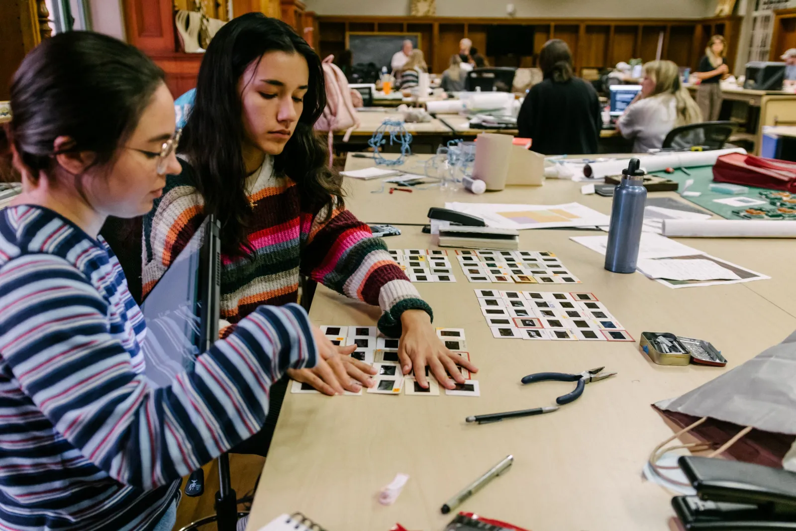 Students working on their lamp project in studio