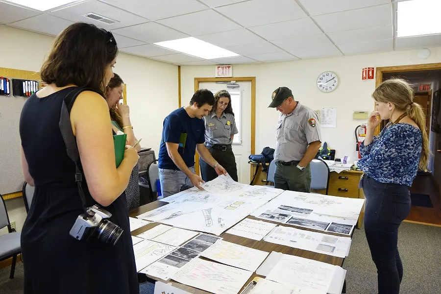 Students presenting work to National Park Servics officials.