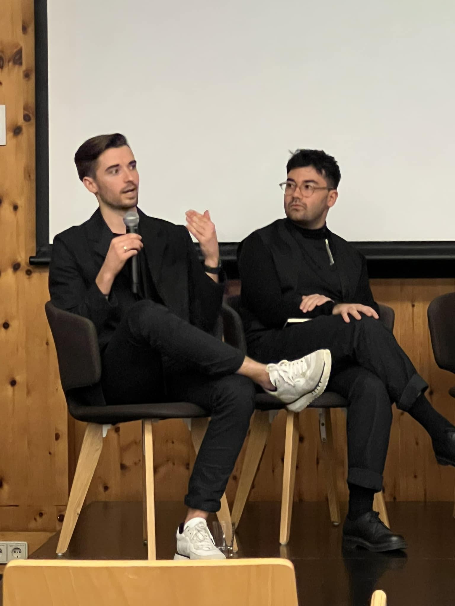 Patrick Danahy sitting in a chair with a microphone.