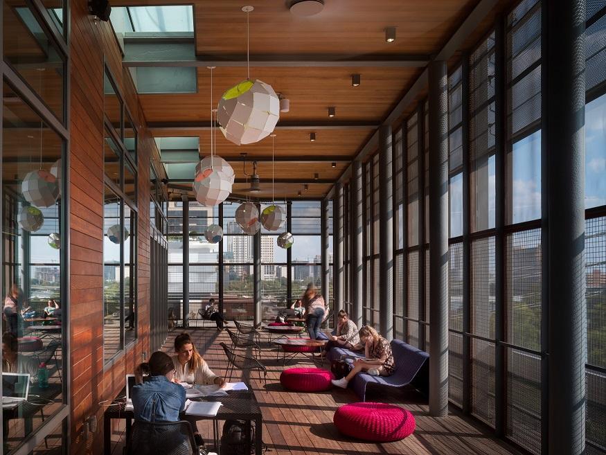 People reading in one of the Austin Central Library's many light-filled spaces