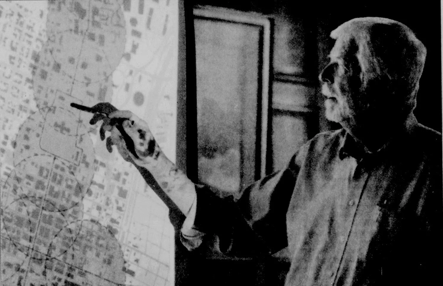 Black and white photo of Sinclair Black teaching at UT Austin