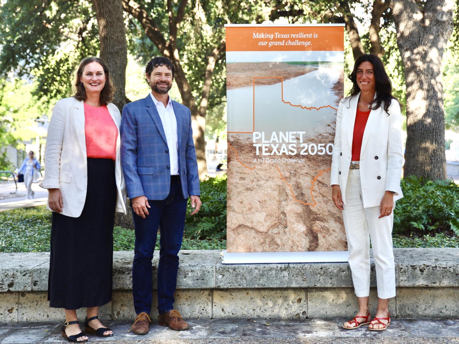 From left to right: incoming co-chairs Katherine Lieberknecht and Patrick Bixler standing with outgoing chair Paola Passalacqua.