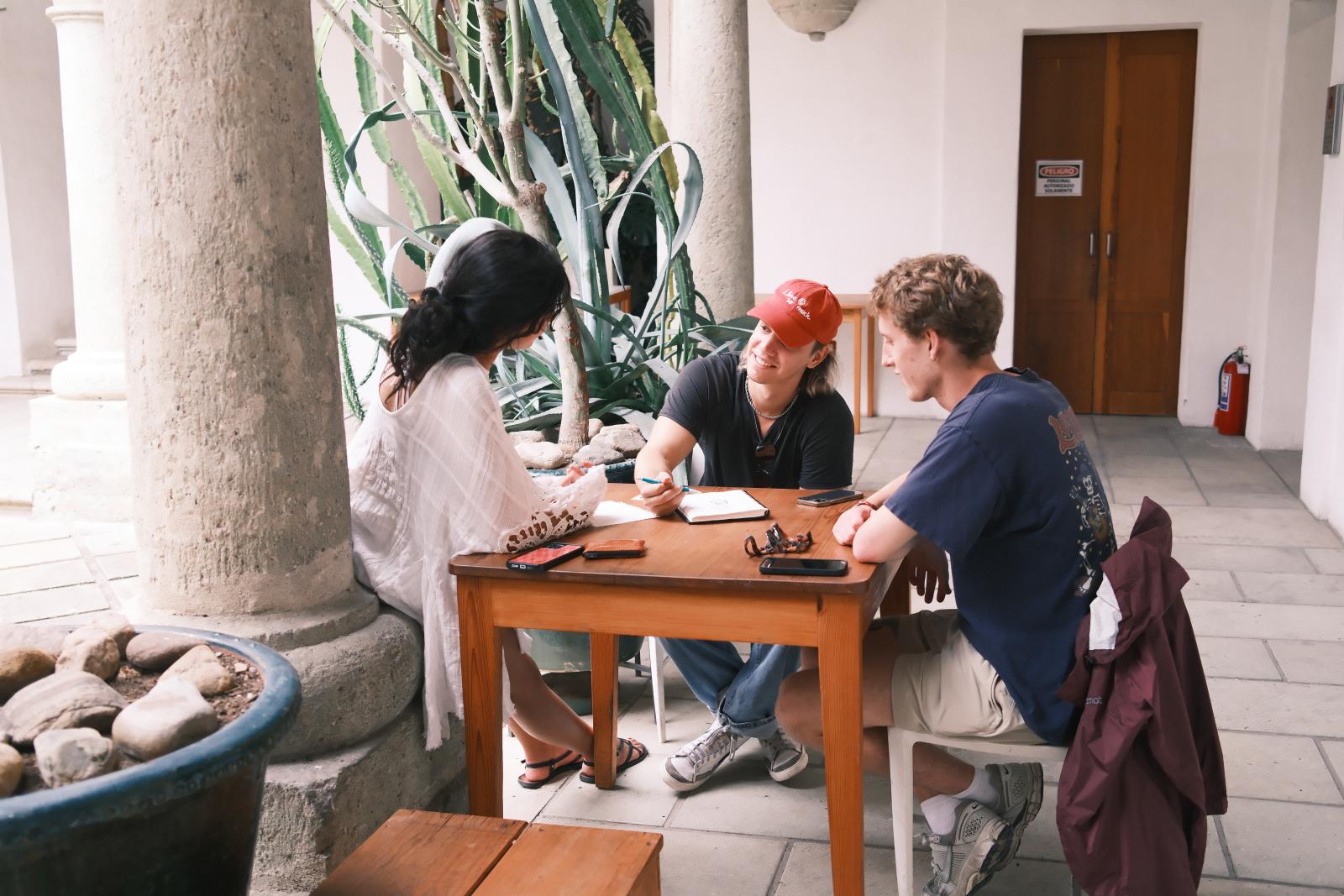 students collaborating at a table