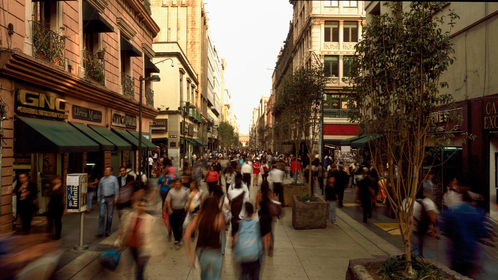 Busy public street with people walking