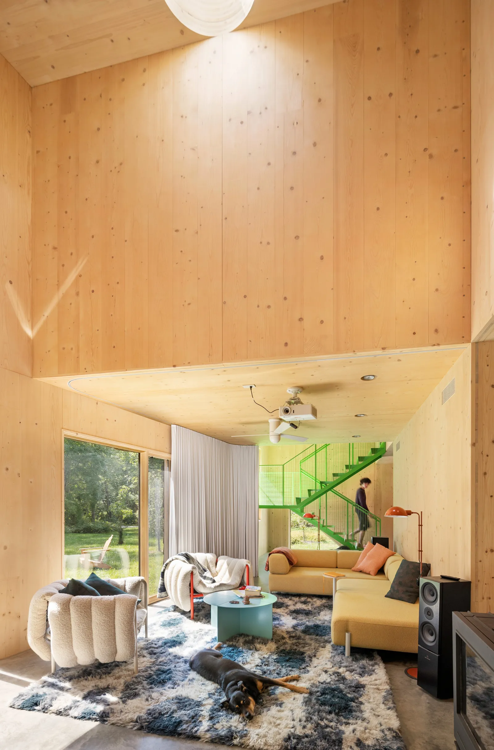 CLT House. Courtesy of Michael Moran Tall living room constructed with CLT