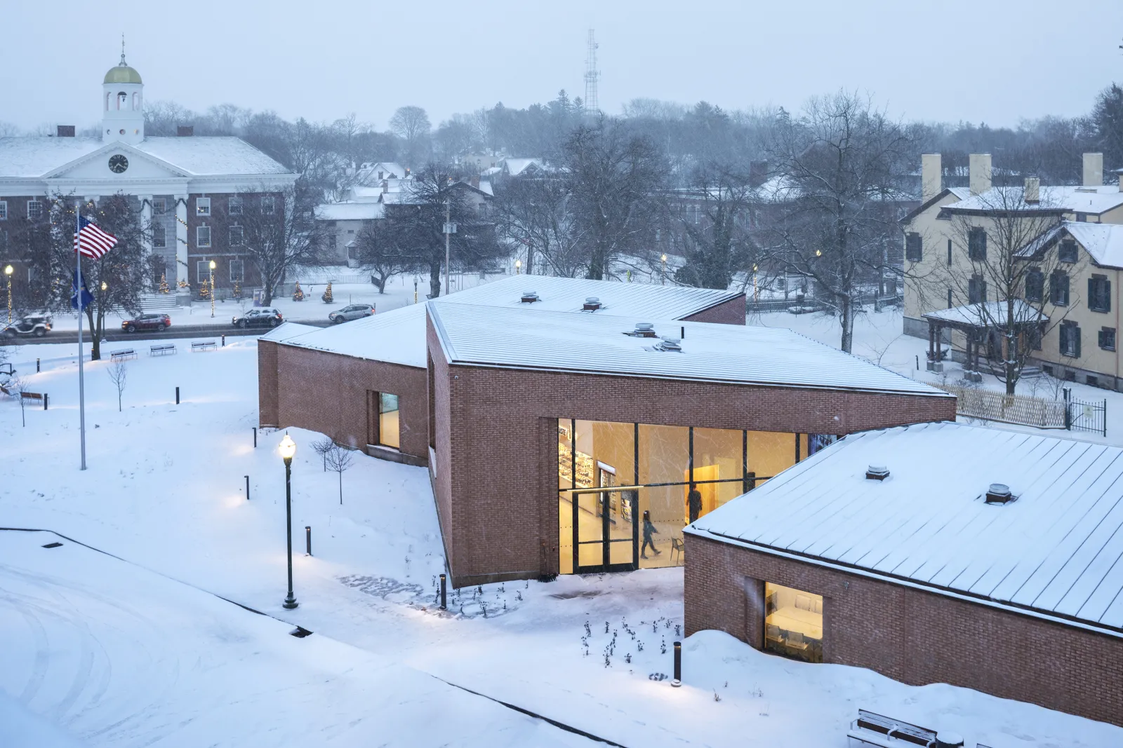 Angular brick building covered in snow