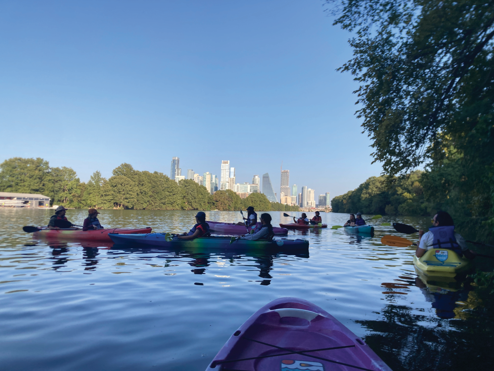 A group of students kayaking on Lady Bird Lake in Austin Texas