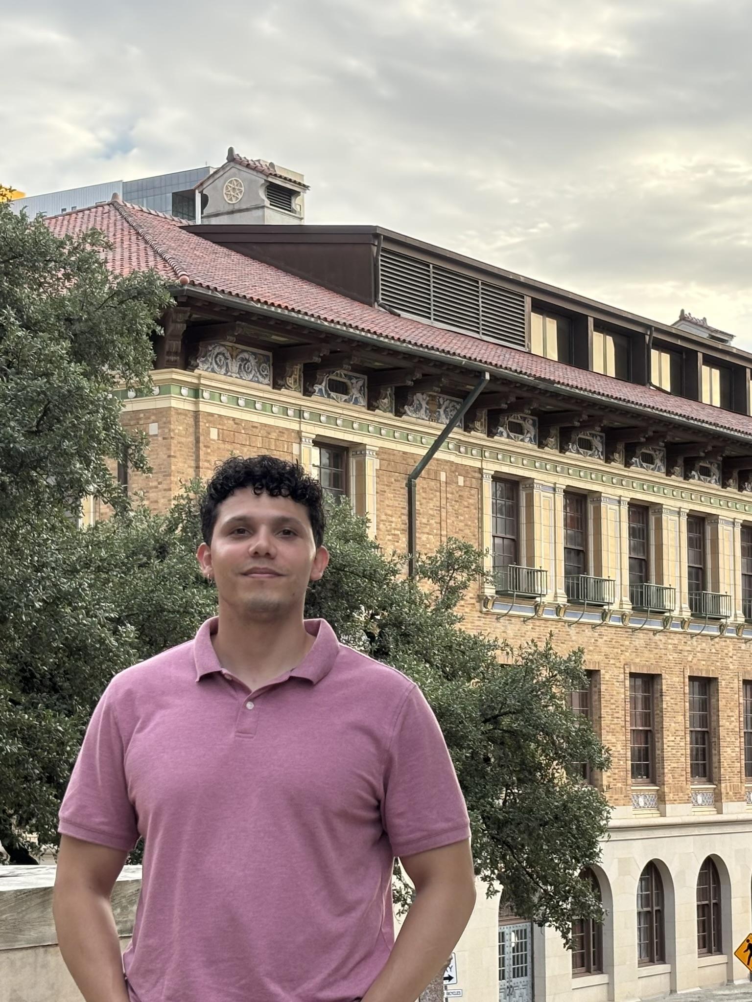 Jeremy stands on UT campus