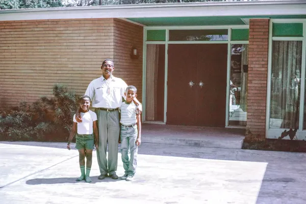 John Chase and his two sons stand in front of their Houston home in the early 1960s