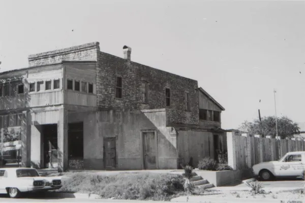 Black and white photo of the Gold Dollar Building