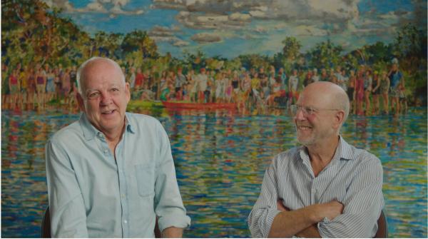 David Lake and Ted Flato sitting comfortbly in front of a watercolor landscape