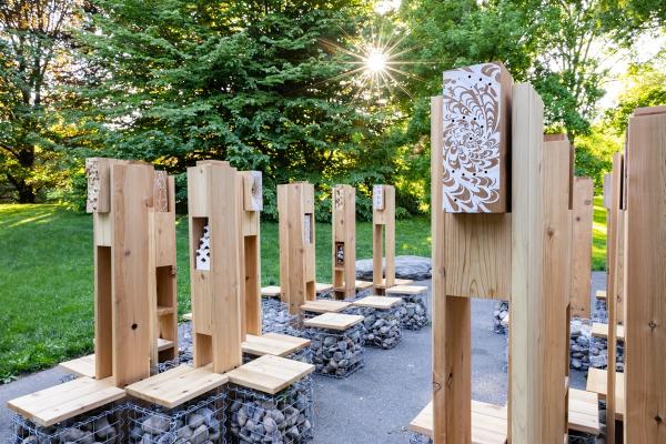 Pollinator Lounge structure seen in the Brooklyn Botanical Gardens in early evening