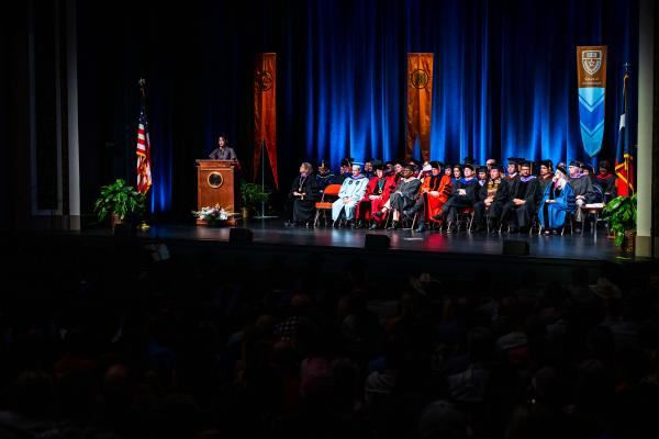 Kotchakorn Voraakhom addresses the UT Austin School of Architecture Graduates