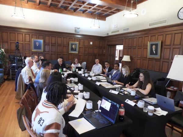 Texas Triangle County Judges Planning and Design Forum People seated at a round table in a discussion