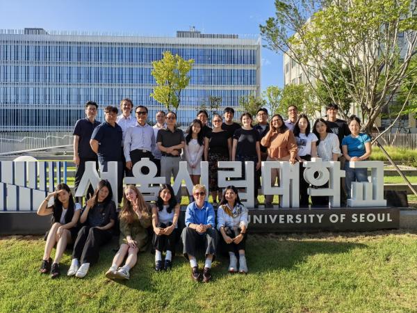 students pose for a group photo in Seoul