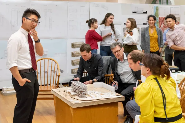 Student engaging with reviewers during architecture final review