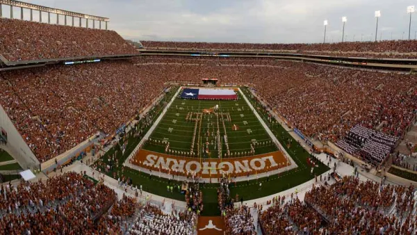 Sold out crowd in burnt orange at UT Austin football stadium