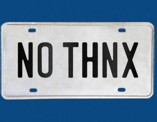 License plate that reads "No Thnx" on a blue background
