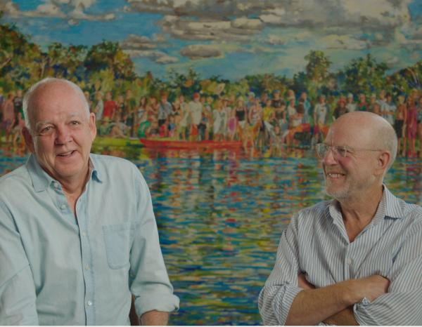 David Lake and Ted Flato sitting comfortbly in front of a watercolor landscape