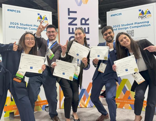 Students holding certificates