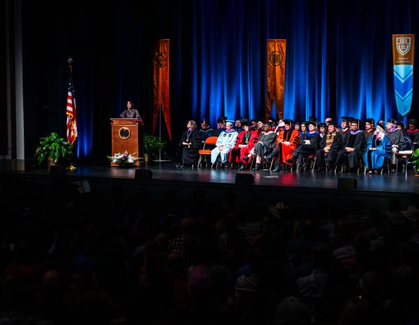Kotchakorn Voraakhom addresses the UT Austin School of Architecture Graduates