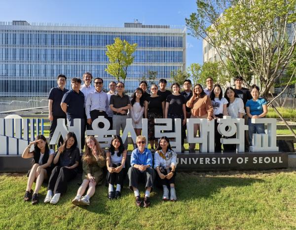 students pose for a group photo in Seoul