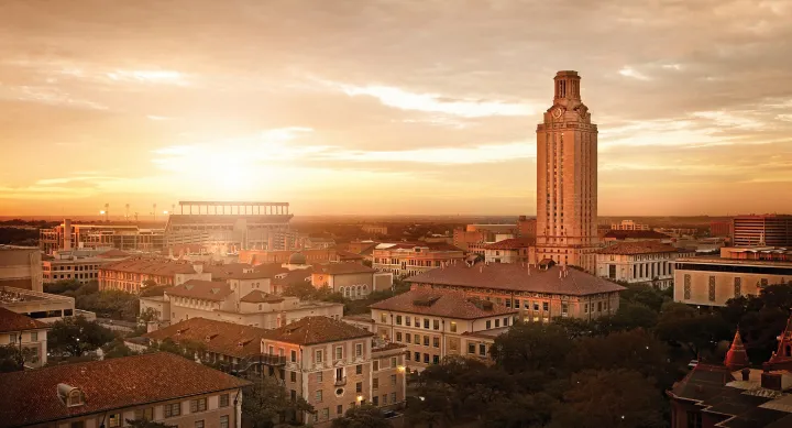 Aerial shot of campus at sunrise with the tower on the left side