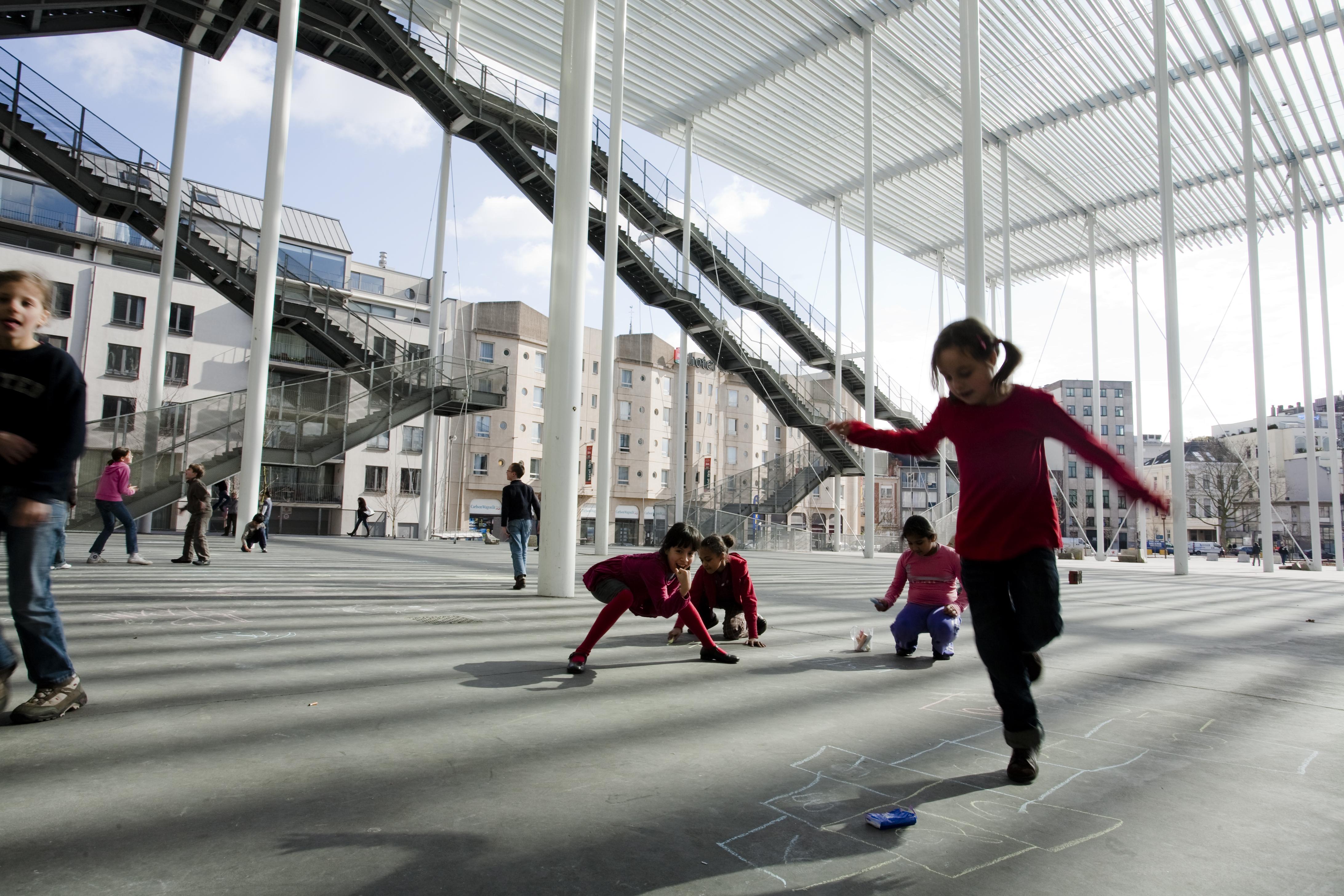 students playing in an urban environment