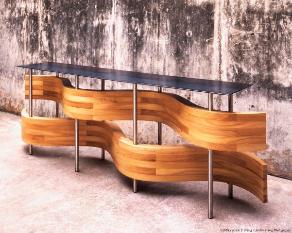 An undulating wooden shelf by Mark Macek