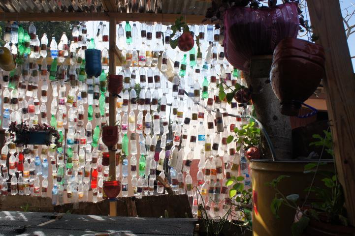 Bottles hanging like a curtain in a home in the Dominican Republic