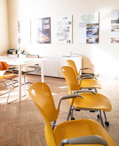 Yellow chairs in a light-filled office