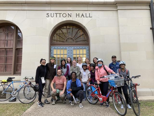 CRP students in front of Sutton Hall with bikes