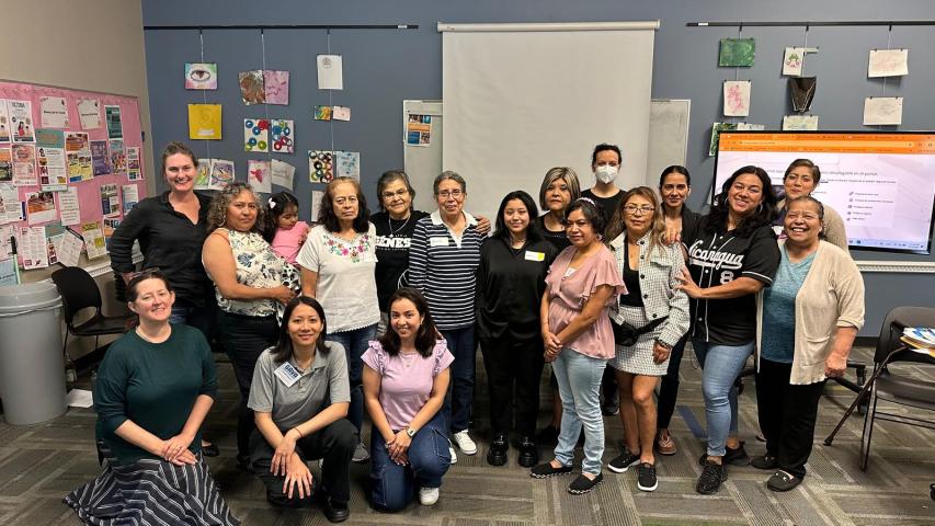 Katherine Lieberknecht pictured with 16 attendees of the Climate Navigators Community Meeting