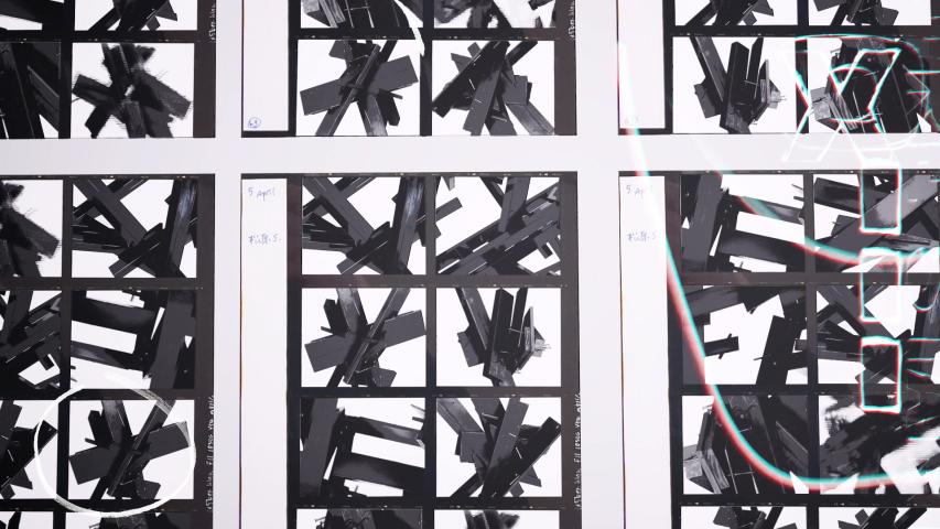 Video frame of black and white planks