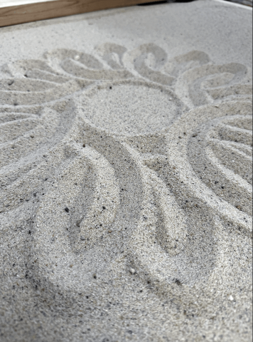 design in sand made by robots
